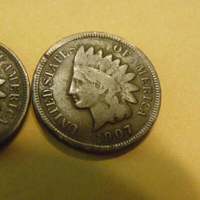 2- 1907 Indian head pennies.