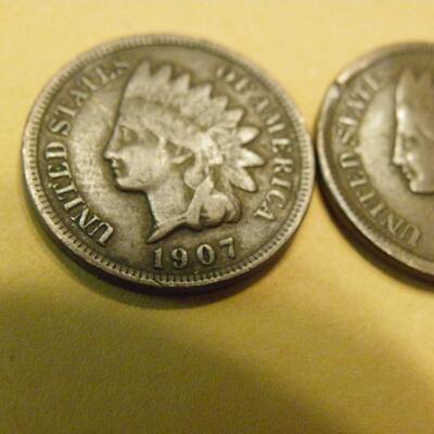 2- 1907 Indian head pennies.