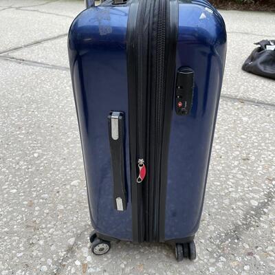 Lot 308  Delsey Navy Carry-on Hard Sided Luggage