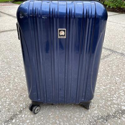 Lot 308  Delsey Navy Carry-on Hard Sided Luggage