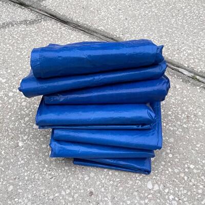 Lot 314  Seven Blue Tarps