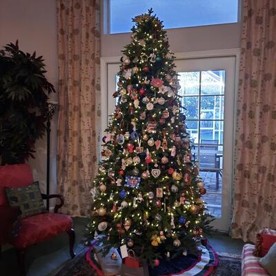 Lot 321  9.5' Pre-lit Beautiful Christmas Tree with Remote.  