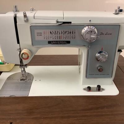 CB561 Universal Deluxe UN-100 Sewing Machine with Stand and Accessories