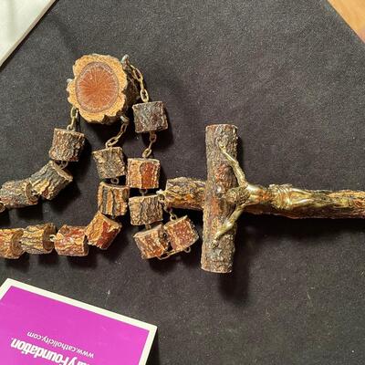 Lot 330 Oversized Wooden Rosary, Wooden Carving of Holy Family from Israel, "Footprints" Wall Hanging, Mug, and 2 Hand Towels 