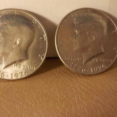 5 Kennedy centennial  half dollars in mint shape.