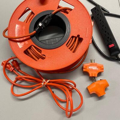 Lot 348 Extension Cords. Larger Cord, Smaller Cord, 2 Adapters and Power Strip