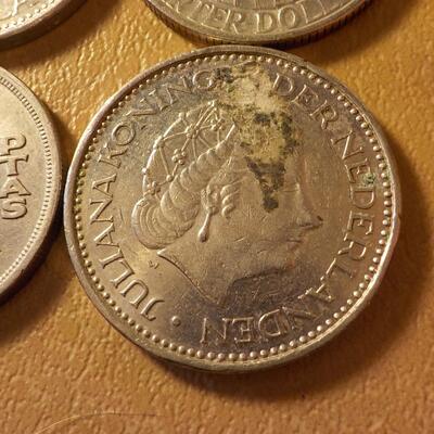 4- Mix of Canadian, US, England, Mexican coins.