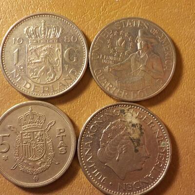 4- Mix of Canadian, US, England, Mexican coins.