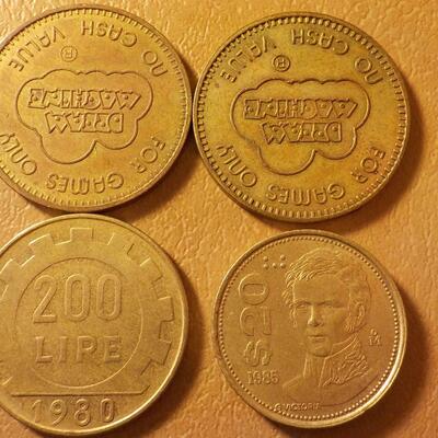 4 coins, 2 Dream Coins and peso and Denmark coin.