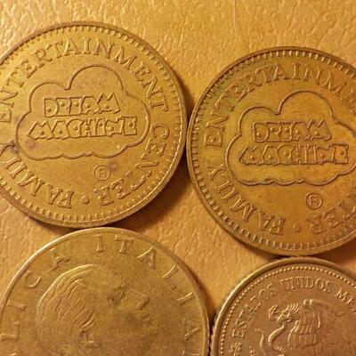 4 coins, 2 Dream Coins and peso and Denmark coin.