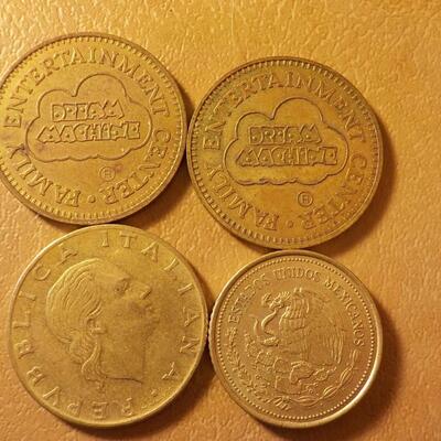 4 coins, 2 Dream Coins and peso and Denmark coin.