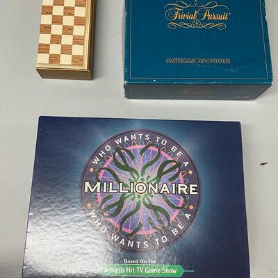 Lot 361  Game Assortment 2: Trivial Pursuit, Magnetic Chess Set, Who Wants To Be A Millionaire
