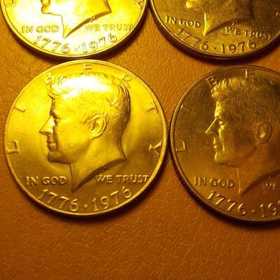 4 Kennedy half dollars 1776-1976.