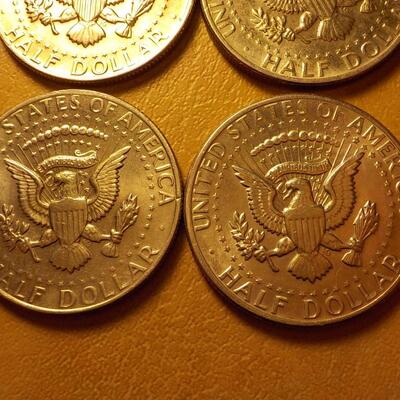 6 Kennedy half dollars 67, 79, 71.