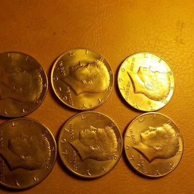6 Kennedy half dollars 67, 79, 71.