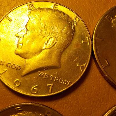 6 Kennedy half dollars 67, 79, 71.
