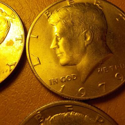 6 Kennedy half dollars 67, 79, 71.