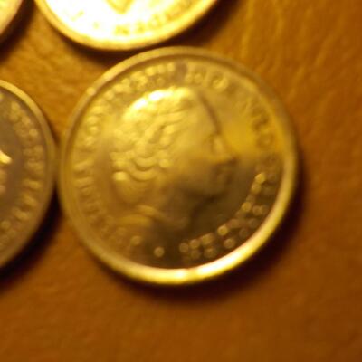 6- English 10 cent pieces.
