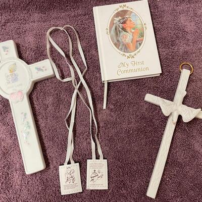 Lot 409  First Communion Relics. Precious Moments Cross Included.