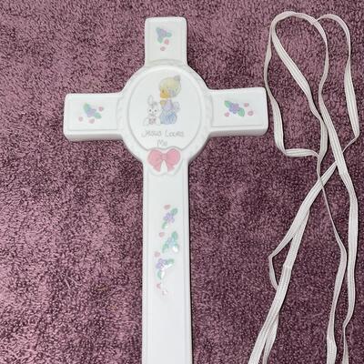 Lot 409  First Communion Relics. Precious Moments Cross Included.