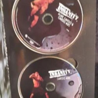 Lot 411 Insanity Exercise Disk Set. Preowned