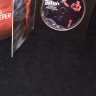 Lot 411 Insanity Exercise Disk Set. Preowned