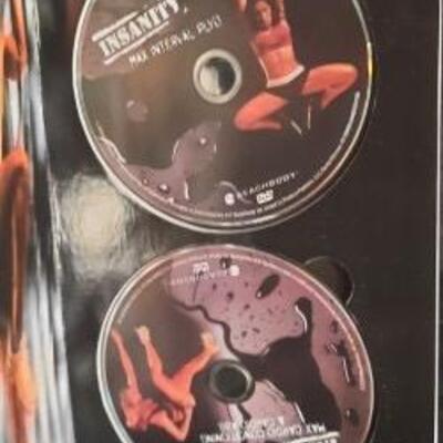Lot 411 Insanity Exercise Disk Set. Preowned