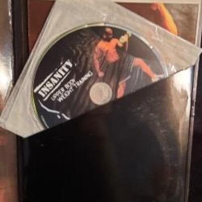 Lot 411 Insanity Exercise Disk Set. Preowned