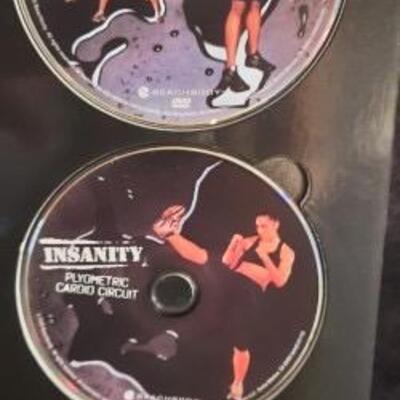 Lot 411 Insanity Exercise Disk Set. Preowned