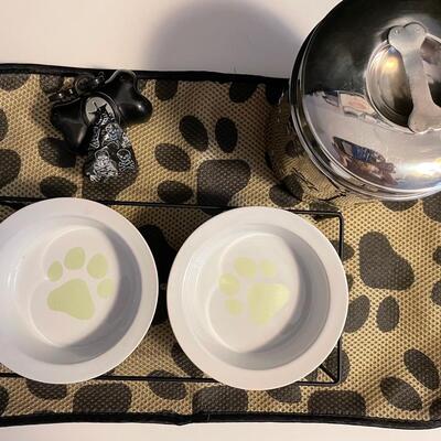 Lot 424  Pet Items: Floor-mat, Treat Container, 2 Bowl Food Stand, and Pooh Bags