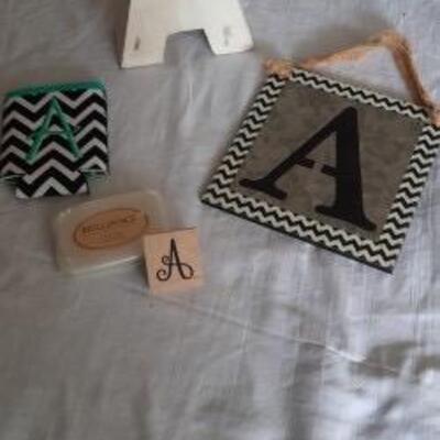 Lot 437  "A" group: Wood Block, Tin Wall Hanging, Ink Stamp & Pad, Cozi
