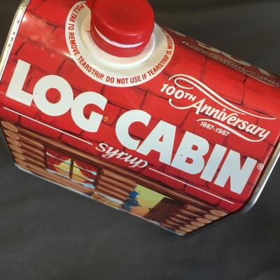 1987. Log cabin tin