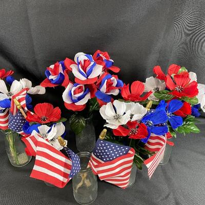 Red, White, and Blue Flowers in Milk Jug Bottle Vases