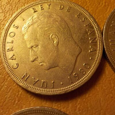 5 1980 Foreign collector coins.