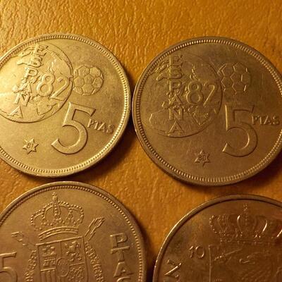 5 1980 Foreign collector coins.