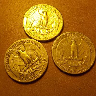 3- 1950's silver quarters.