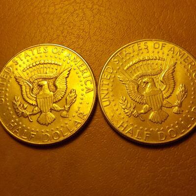2- 1964 Kennedy Silver half dollars.