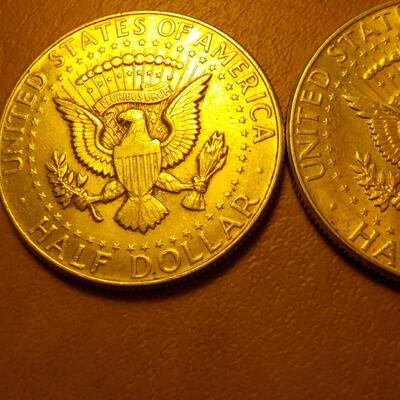 2- 1964 Kennedy Silver half dollars.