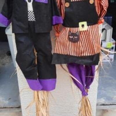 Lot 449  Pair of Halloween Yard Decorations and Boo Sign