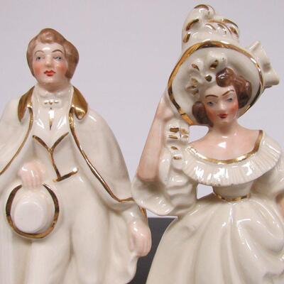 Vintage Tall Pair Man and Lady Figurines Unsigned 