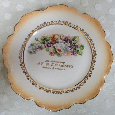Vintage Advertising Plate EA Meckelberg Jeweler and Optition 4th Anniversary