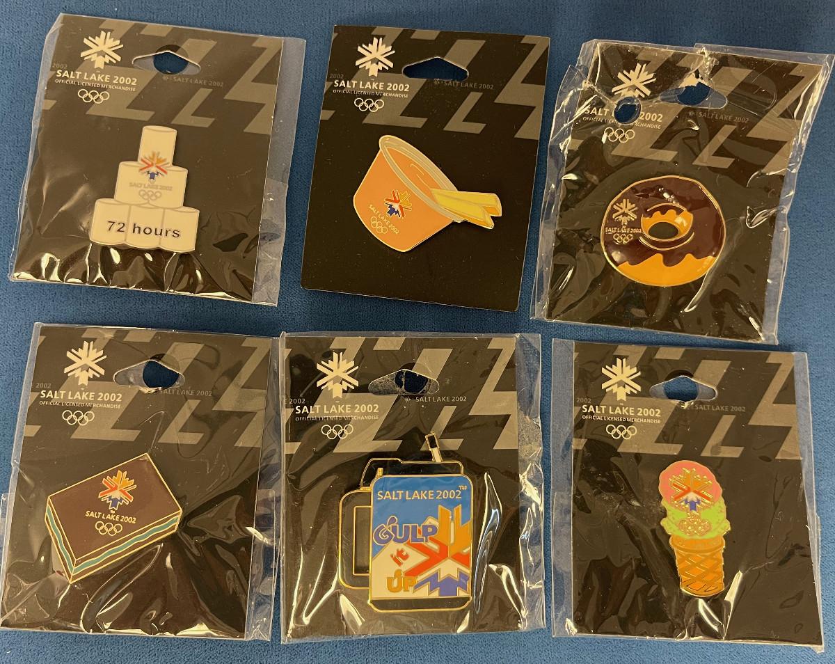 54 (6) Food Related Olympic Pins. Fry Sauce included.