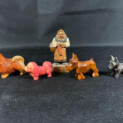 Carved Wood Miniature Old Lady with 4 Dogs