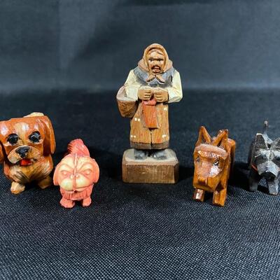 Carved Wood Miniature Old Lady with 4 Dogs