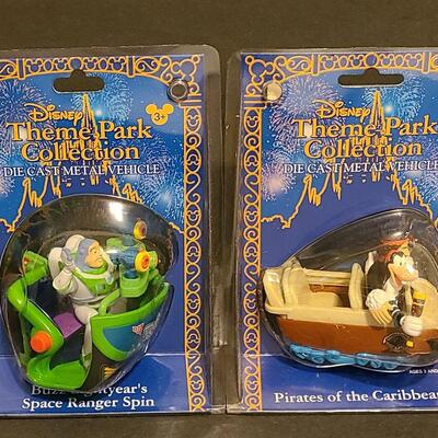 Lot 15: Disney Die Cast Collectibles: Pirates fo the Caribbean & Buzz Lightyear Space Ranger Spin 