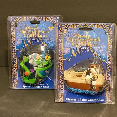 Lot 15: Disney Die Cast Collectibles: Pirates fo the Caribbean & Buzz Lightyear Space Ranger Spin 