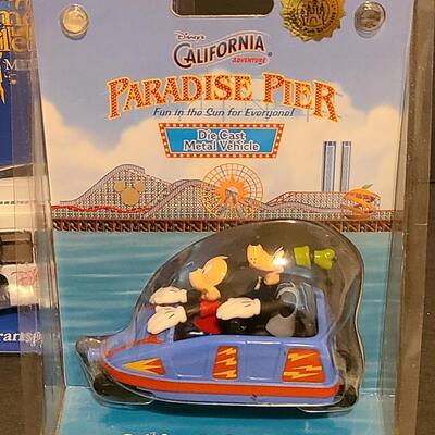 Lot 19: Disney Die Cast Collectibles: Transport Bus and California Screamin Coaster 