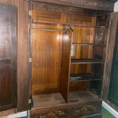 Antique large walnut wardrobe/armoire with beveled mirror doors