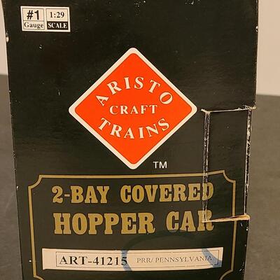 Lot 28: Aristo-Craft Pennsylvania Bobber Caboose & 2 Bay Covered Hopper Car Art 41215/22601C