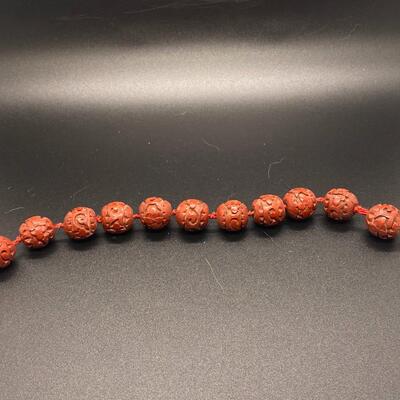 String of Carved Red Cinnabar Beads